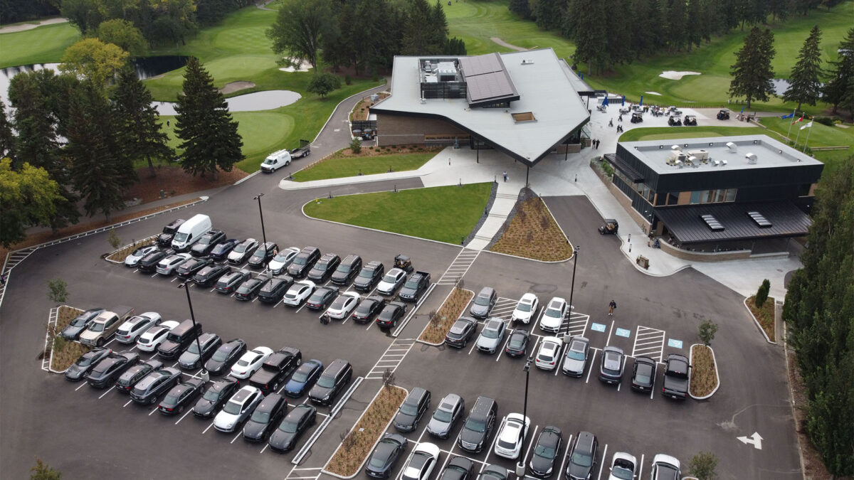 overhead drone shot of royal mayfair golf club with roof top solar array 