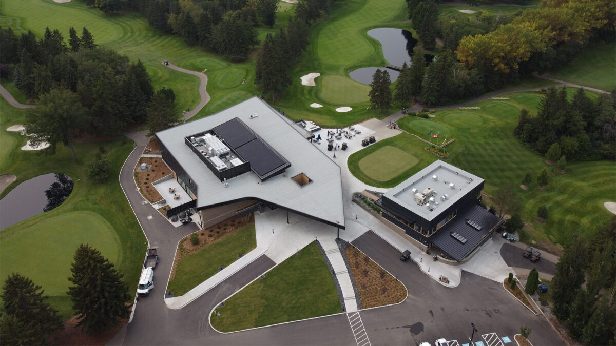 overhead drone shot of royal mayfair golf club with roof top solar array 