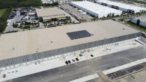 drone photo of solar panels on building roof