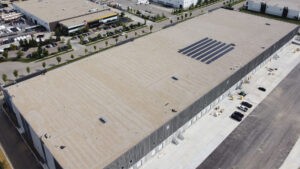 Drone photo of Hopewell and Crestpoint warehouse with solar panels on the roof