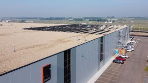 Roof top solar array on swift oilfield building